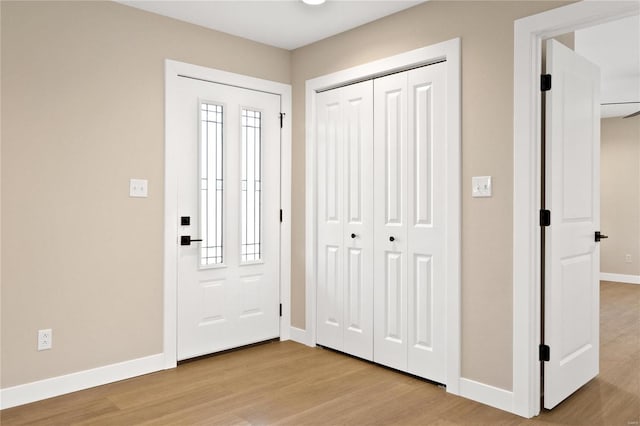 entrance foyer with light hardwood / wood-style floors