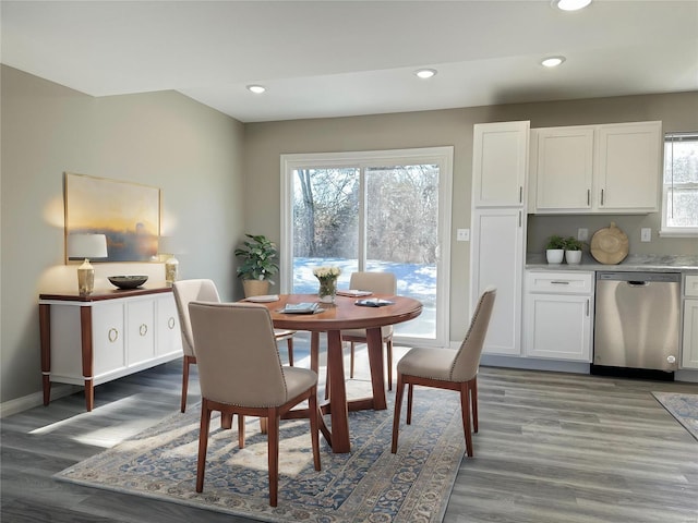 dining room with dark hardwood / wood-style flooring