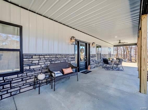 view of patio with ceiling fan