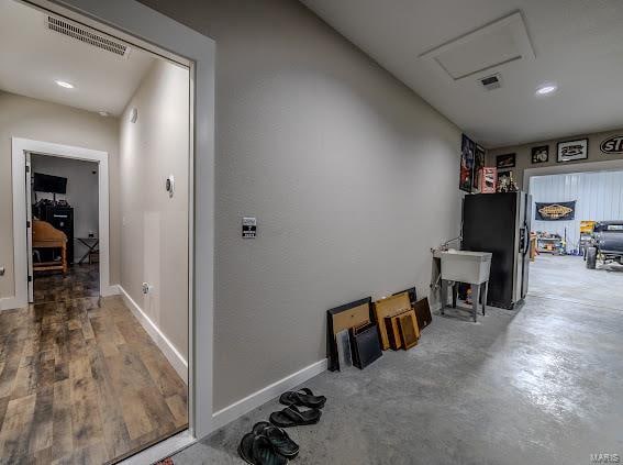 corridor featuring hardwood / wood-style flooring