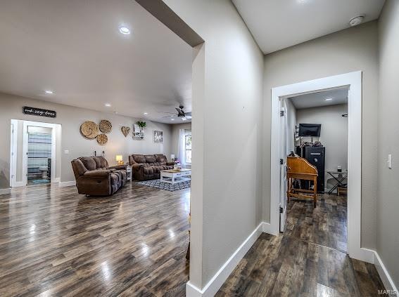 hallway featuring dark hardwood / wood-style flooring