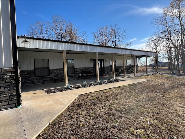 view of property's community featuring a patio area