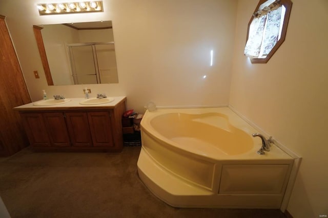 bathroom featuring vanity and plus walk in shower