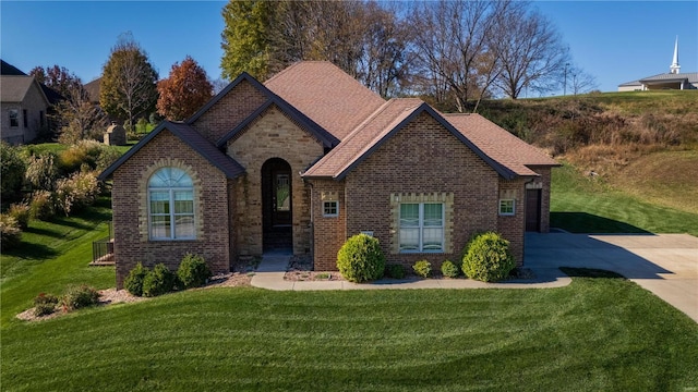 view of front of home with a front yard