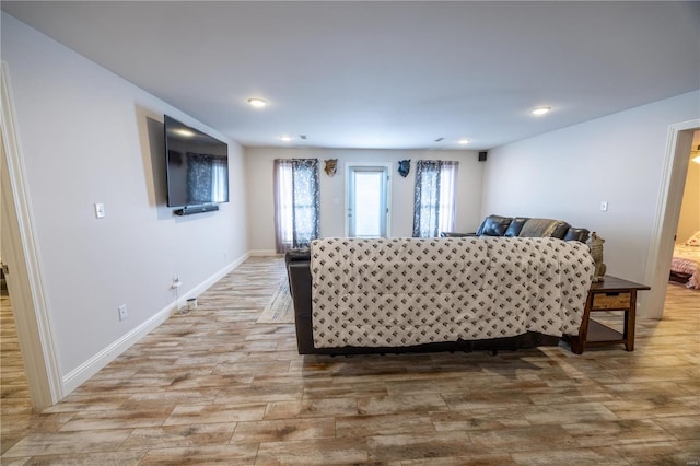 living room with light hardwood / wood-style floors