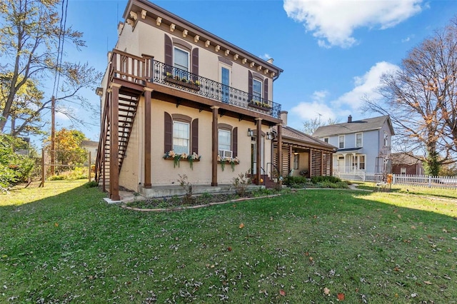 view of front facade with a front yard