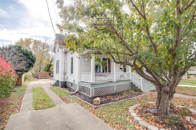 obstructed view of property with a porch