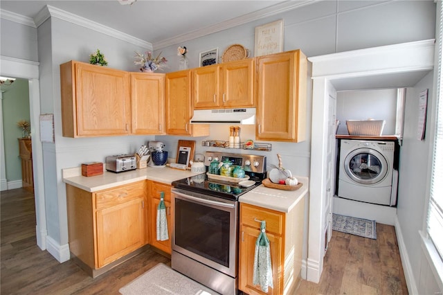 kitchen featuring ornamental molding, hardwood / wood-style floors, stainless steel range with electric stovetop, and washer / clothes dryer