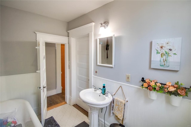 bathroom featuring a tub to relax in