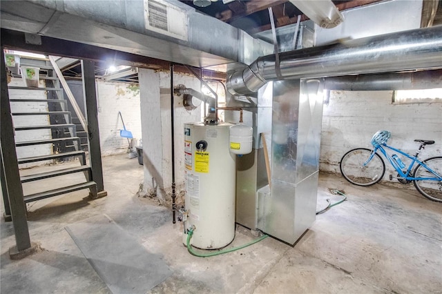 utility room with water heater and heating unit