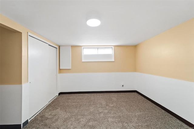 basement featuring carpet flooring