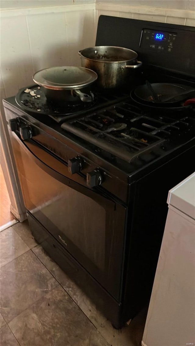 details featuring black gas range