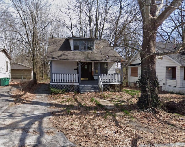 bungalow-style home with a porch