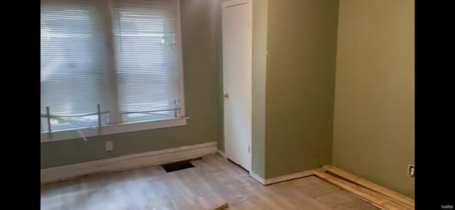 interior space featuring a wealth of natural light and light hardwood / wood-style floors