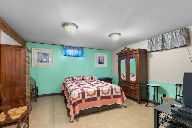 bedroom with light tile patterned flooring