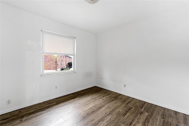 spare room featuring hardwood / wood-style floors