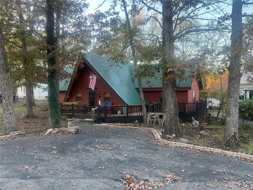 cabin featuring a wooden deck