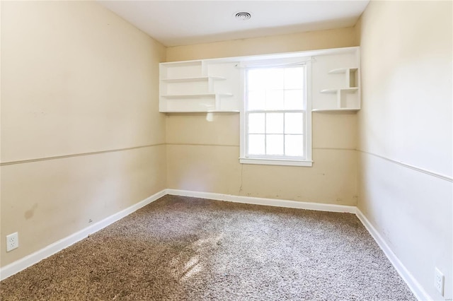 view of carpeted spare room