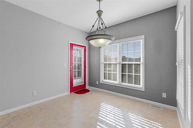 interior space featuring light tile patterned flooring