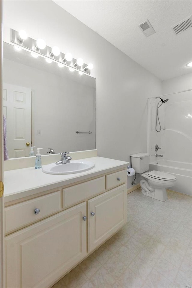 full bathroom with shower / bathing tub combination, vanity, and toilet