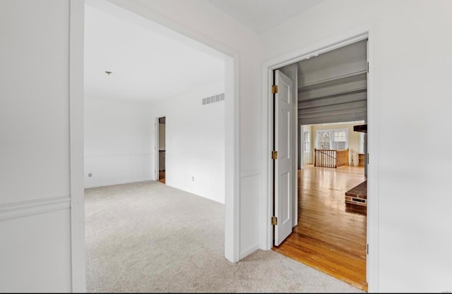 hall featuring light hardwood / wood-style flooring