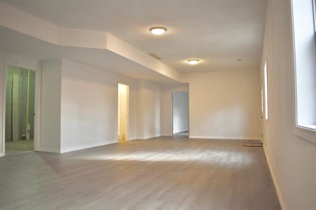 spare room featuring hardwood / wood-style flooring