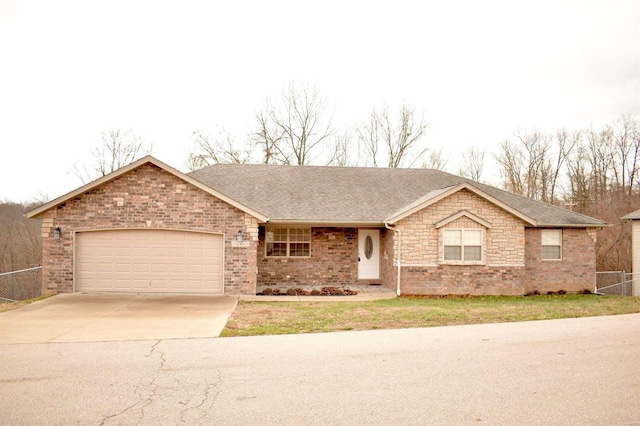 ranch-style home featuring a garage