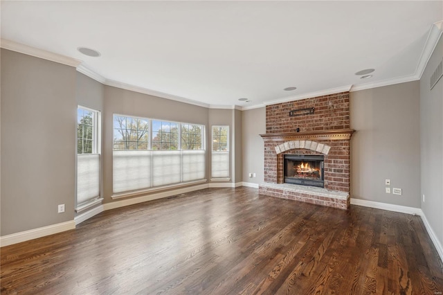 unfurnished living room with a fireplace, dark wood-type flooring, and ornamental molding