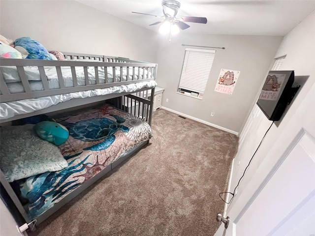 bedroom with carpet, ceiling fan, and lofted ceiling