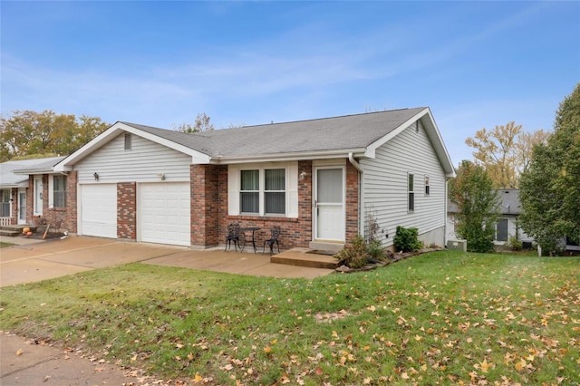 ranch-style house with a garage and a front yard