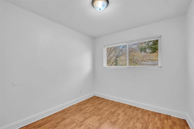 unfurnished room featuring light hardwood / wood-style floors