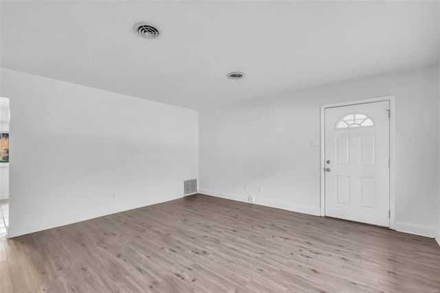 foyer entrance featuring light wood-type flooring