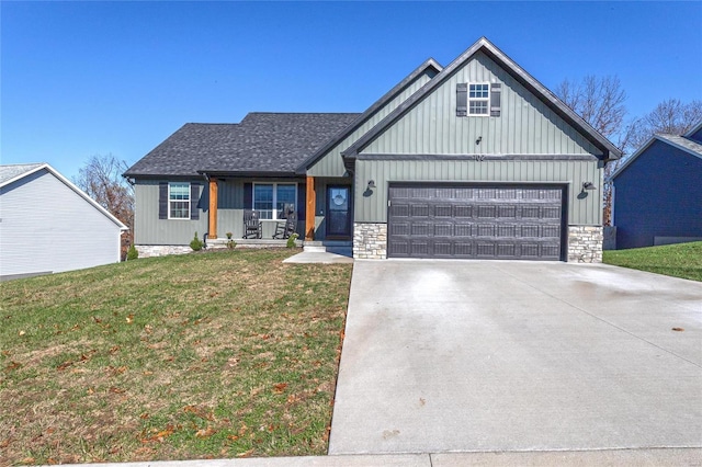 view of front facade with a front lawn and a garage