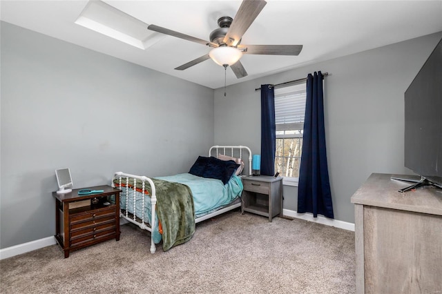 bedroom with ceiling fan and carpet floors