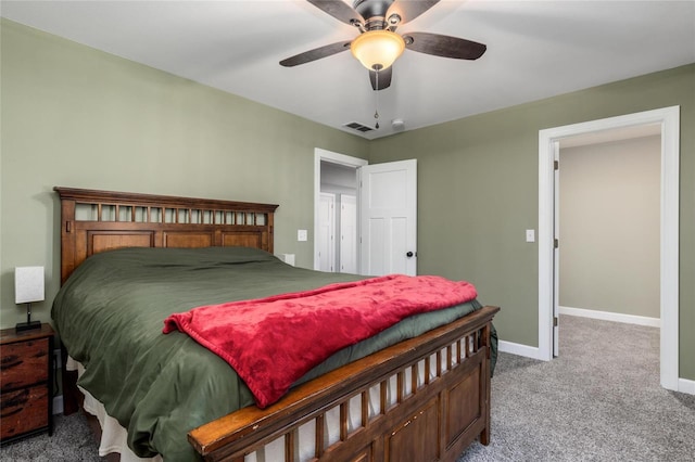 bedroom with ceiling fan and carpet