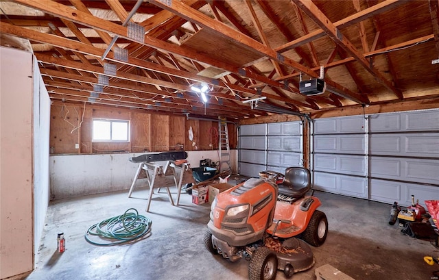 garage featuring a garage door opener