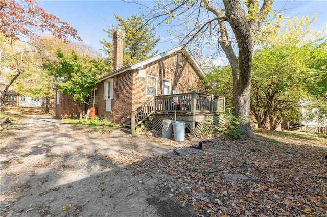 rear view of house with a deck