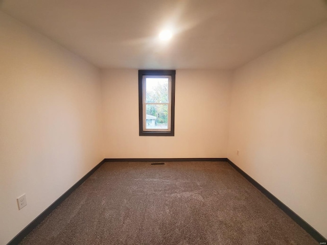 empty room featuring carpet