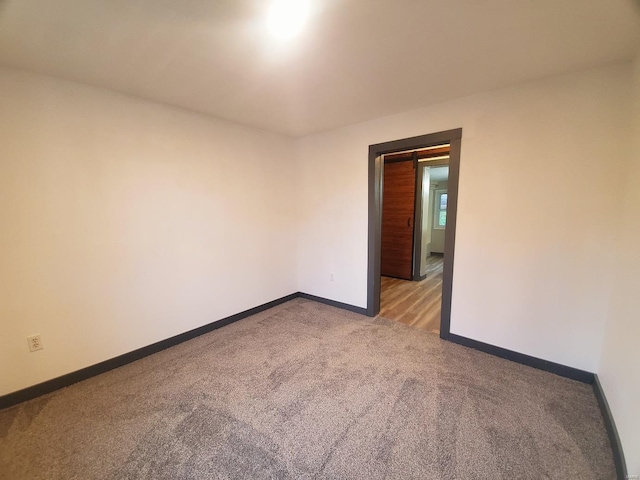 view of carpeted spare room