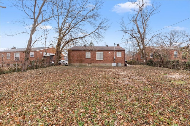 rear view of house with cooling unit