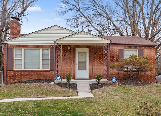 bungalow with a front lawn