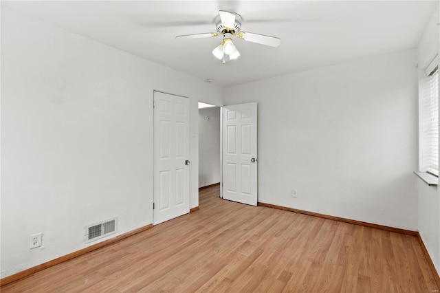 unfurnished bedroom featuring ceiling fan and light wood-type flooring