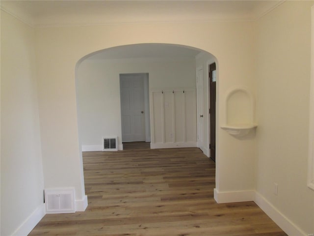 unfurnished room featuring hardwood / wood-style flooring