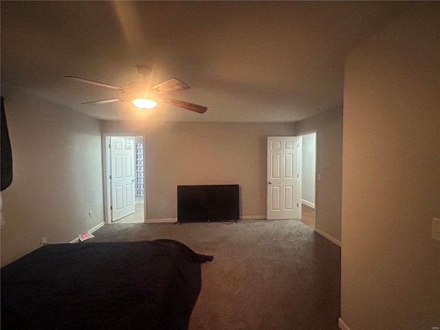 bedroom featuring ceiling fan and carpet flooring