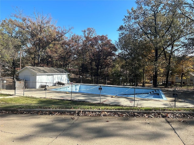 view of pool featuring an outdoor structure