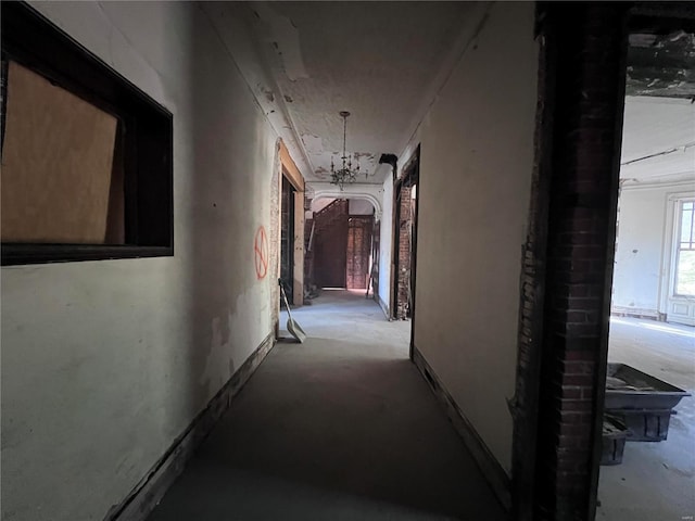 hallway featuring concrete flooring