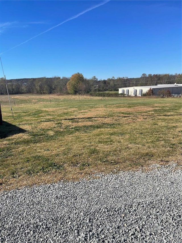 view of yard featuring a rural view