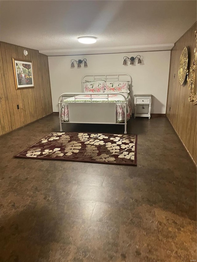 bedroom with wooden walls