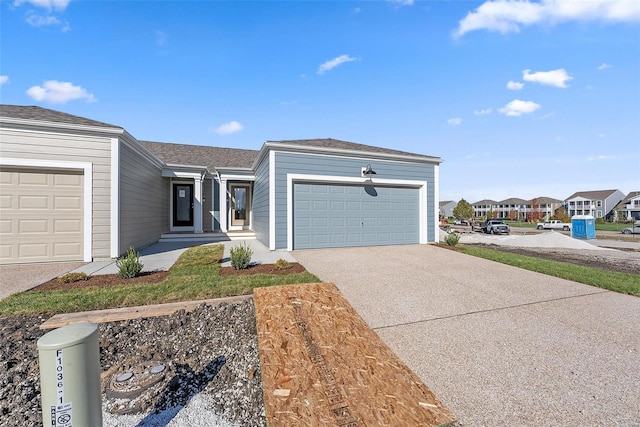 single story home with a garage