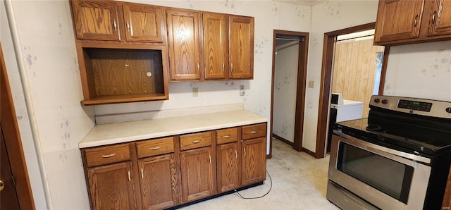 kitchen featuring stainless steel electric range